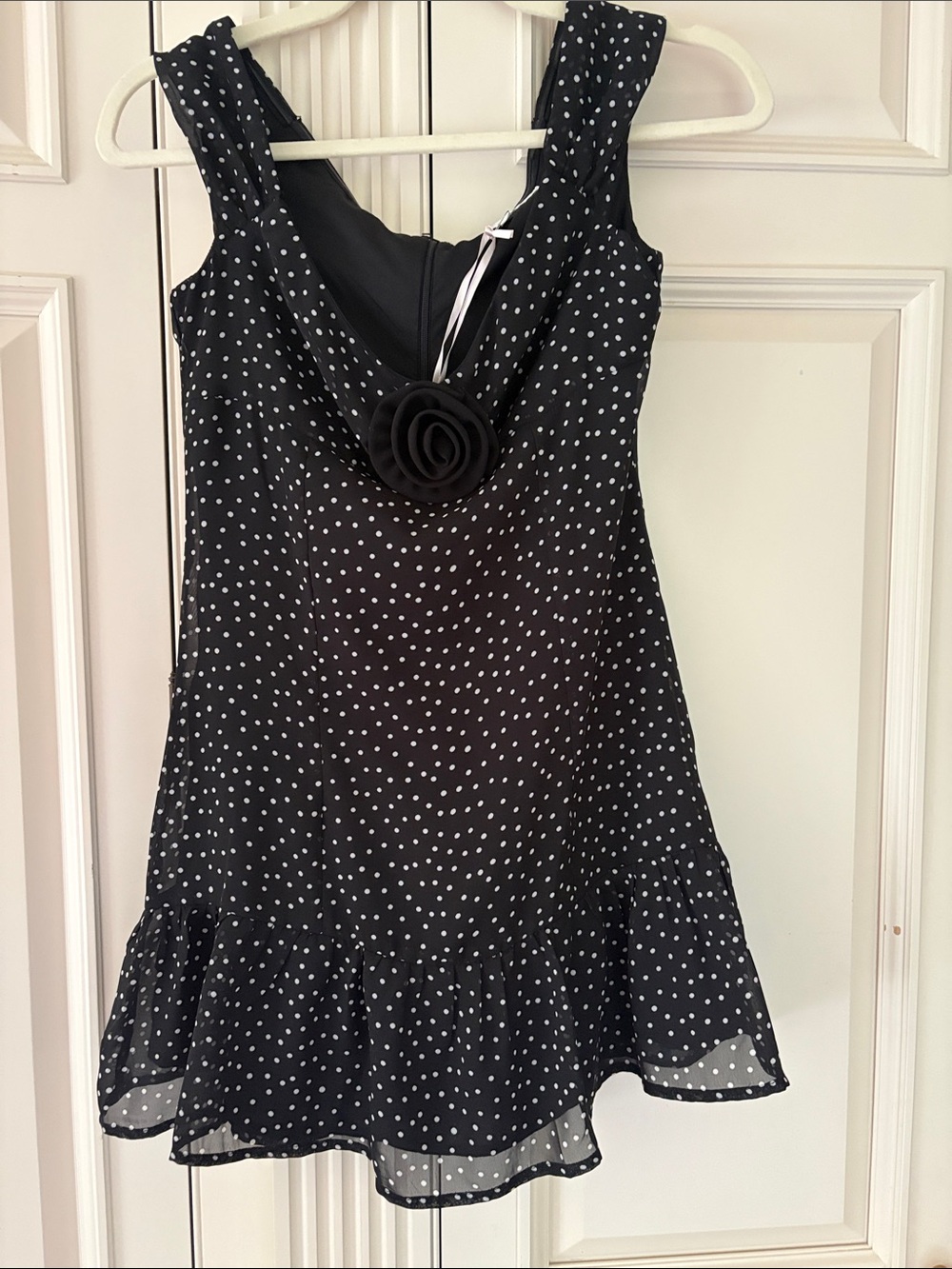 Black Polka Dot Mini Dress with Floral Accent